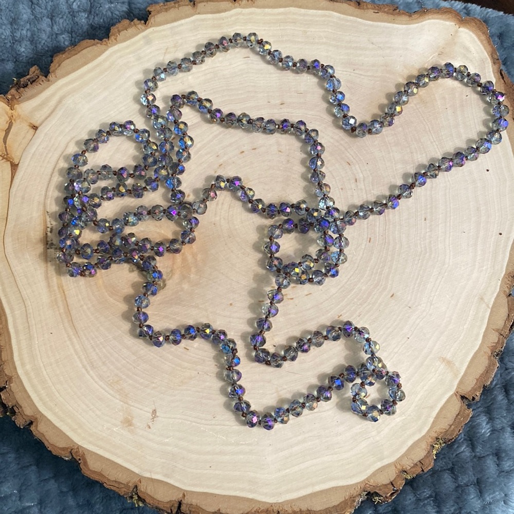 Long knotted crystal necklace